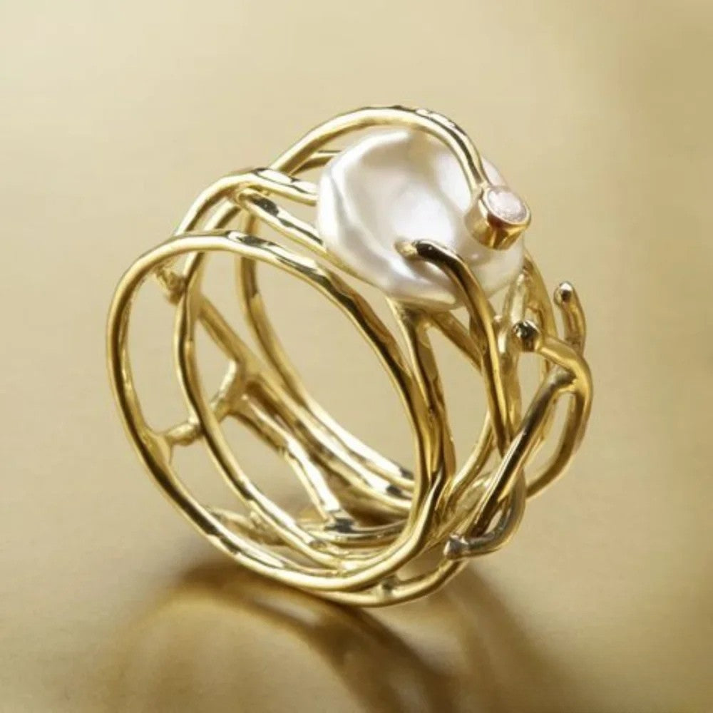 Anillo antiguo fino con perla