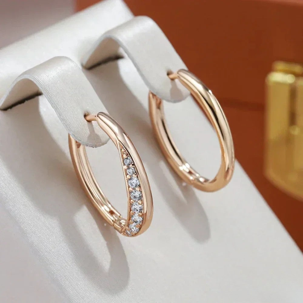Elegantes pendientes de aro dorados