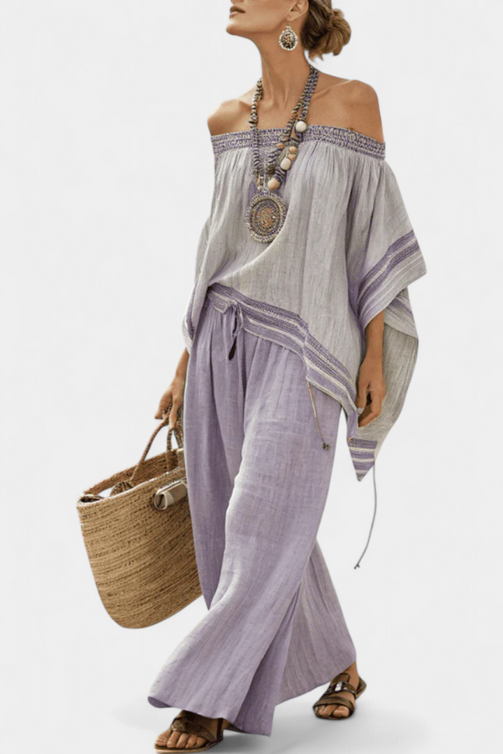 Zandrel | Elegante top con hombros descubiertos y pantalones anchos a rayas