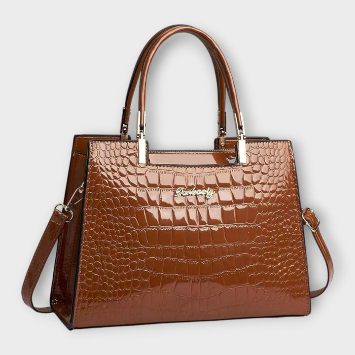 Olivia - Bolso de mano con estampado de cocodrilo brillante