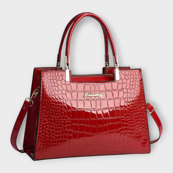 Olivia - Bolso de mano con estampado de cocodrilo brillante