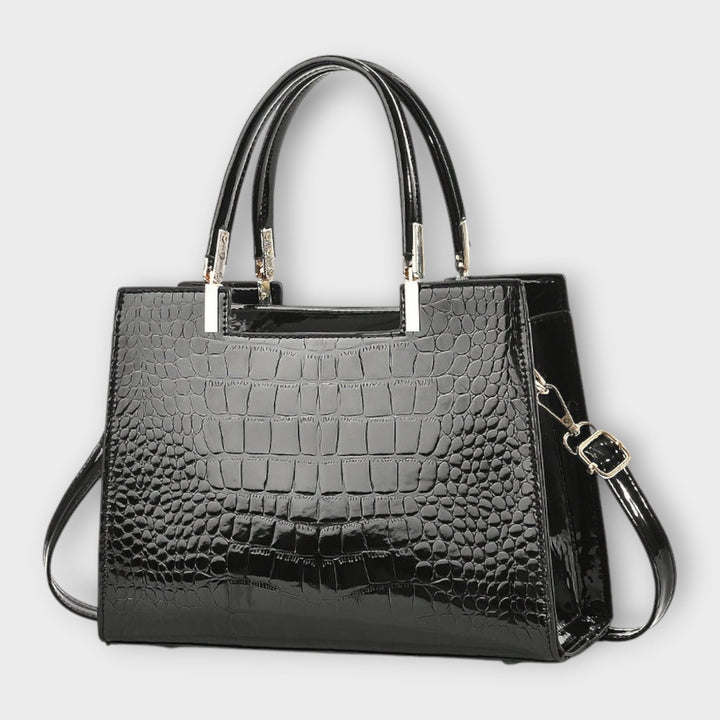 Olivia - Bolso de mano con estampado de cocodrilo brillante