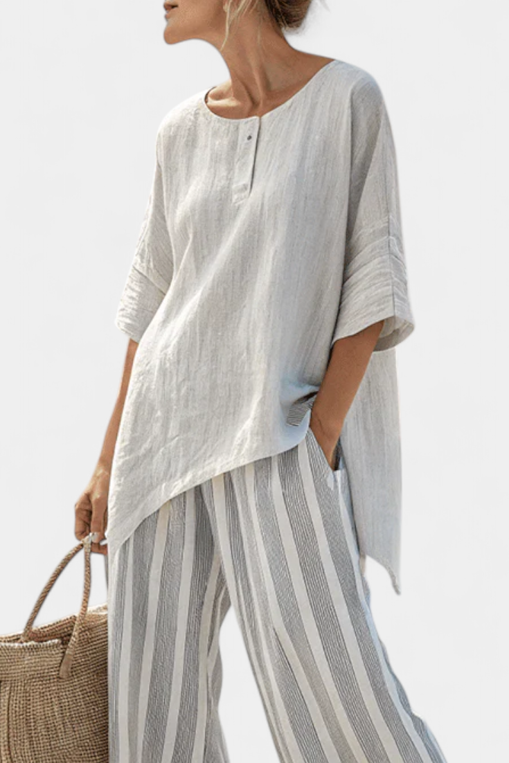 Talvora | Elegante blusa asimétrica y pantalón a rayas